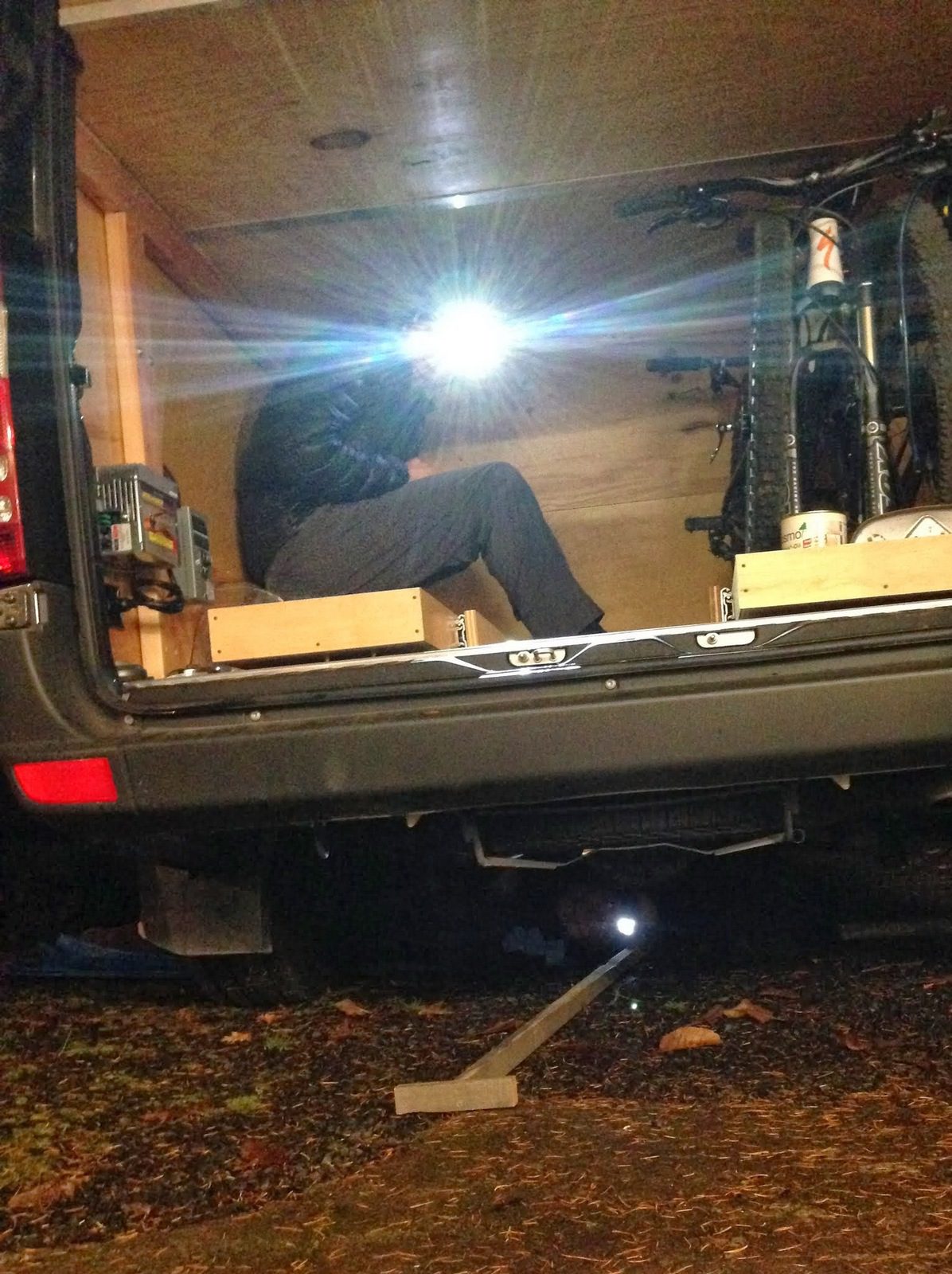 Sub-optimal working conditions... At least my father-in-law is under the van while I'm cramped in the bike garage.