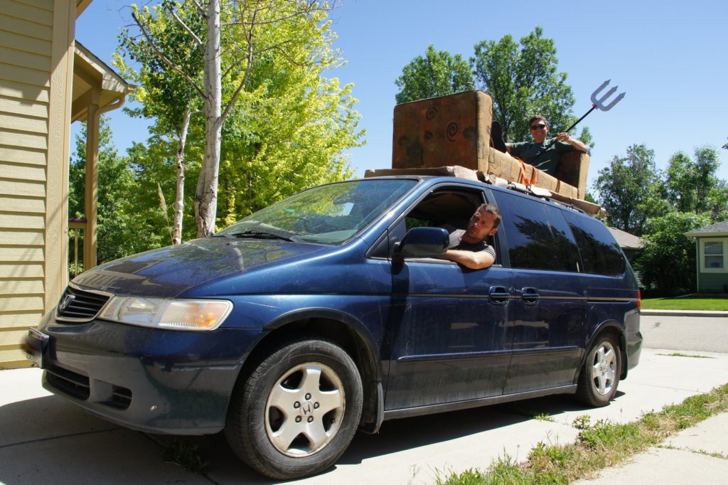 Assisting with a friend's move near Boulder, CO by holding down roof freight while also wielding his favorite trident (we don't have one of those in the van). Got a few odd looks on the drive over. :)