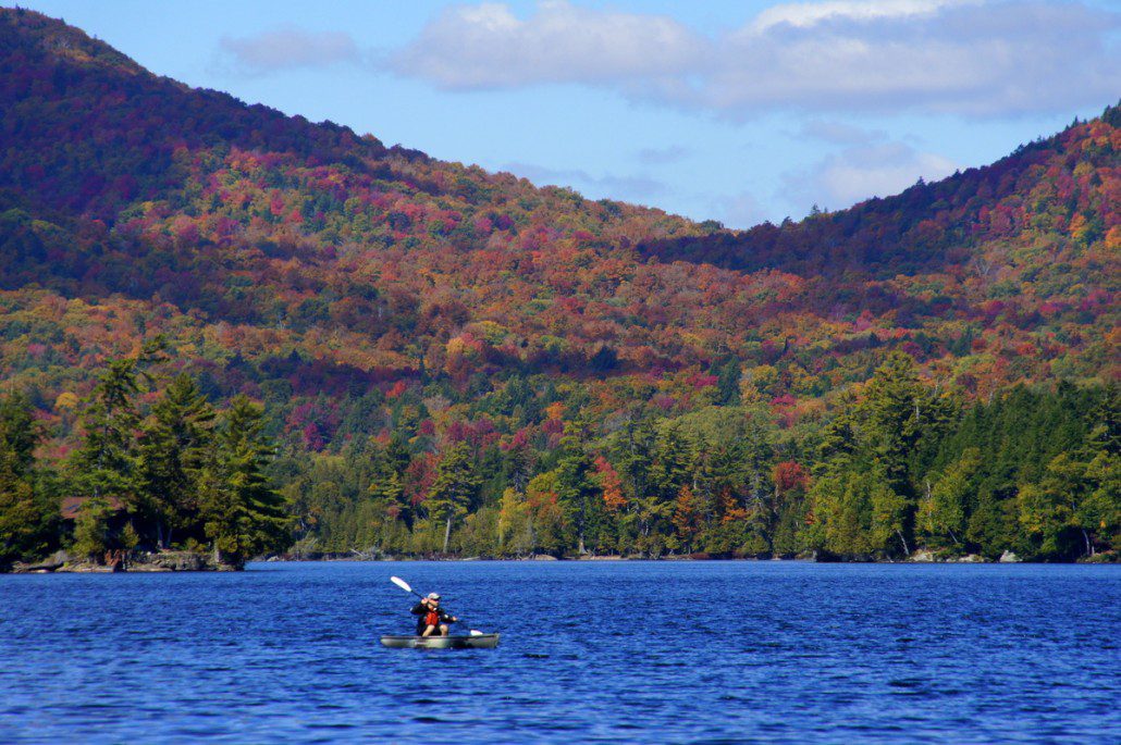 A kayaker on Blue Mountain Lake.