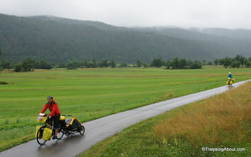 Jen and Dave from Long Haul Trekkers cruise through a misty day in the rolling valleys of Slovenia.