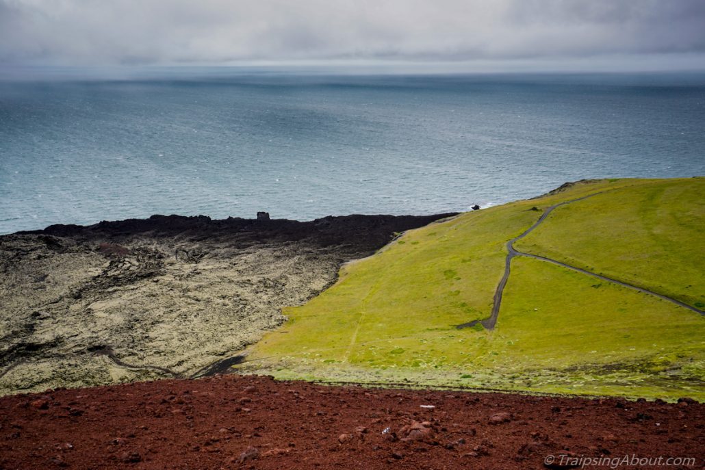 Iceland, a land of contrasts... This view looks from West Man island, a 45-minute ferry ride from the mainland. The black lava is 2 square kilometers that were added during an eruption a few years ago. New real estate!