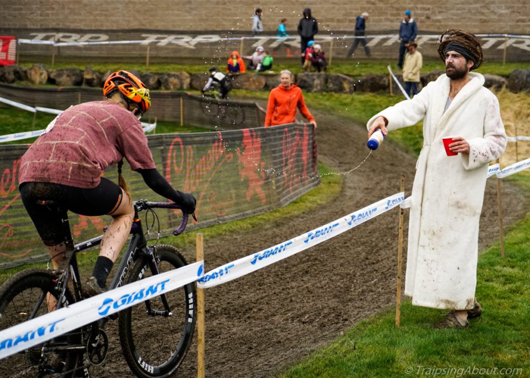 After his own race, Jesus grabbed a beer and flung water at each rider: May Cross be with you!